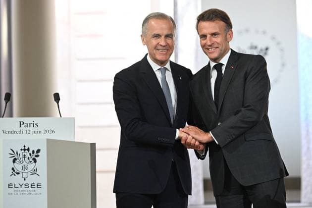 Press Conference of Emmanuel Macron and Mark Carney - Paris Canada s Prime Minister Mark Carney and France s President Emmanuel Macron pictured during a press conference ahead of a bilateral meeting at the Elysee Presidential Palace, in Paris, France on June 12, 2026. Photo by Eric Tschaen Pool ABACAPRESS.COM paris France  Copyright: xTschaenxEric Pool ABACAx