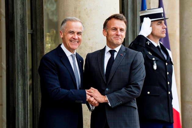 June 12, 2026, Paris, France: Prime Minister Mark Carney, left, is greeted by French President Emmanuel Macron at the Palais de löÄÃ Elysee in Paris, on Friday, June 12, 2026. Paris France  - ZUMAc35_ 20260612_zaf_c35_133 Copyright: xChristopherxKatsarovx