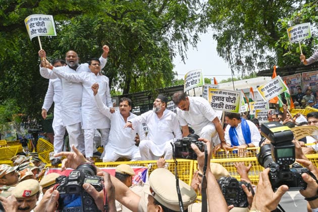 NEW DELHI, INDIA - JUNE 12: Madhya Pradesh Congress party s MLAs and leaders during a protest march from AICC office to the President s House against the rejection of Congress leader Meenakshi Natarajan s nomination for the Rajya Sabha election from Madhya Pradesh on June 12, 2026 in New Delhi, India. (Photo by Arvind Yadav Hindustan Times) Madhya Pradesh Congress MLAs Protest March Against Disqualification Of Rajya Sabha Candidate Meenakshi Natarajan