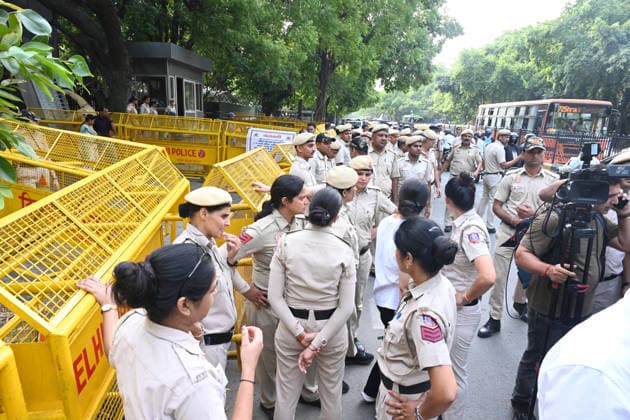 NEW DELHI, INDIA - JUNE 12: Security personnel deployed in view of Congress leaders and workers protest at Nirvachan Sadan (Election Commission of India) against the rejection of Congress leader Meenakshi Natarajan s nomination for the Rajya Sabha election from Madhya Pradesh on June 12, 2026, in New Delhi, India.(Photo by Sonu Mehta Hindustan Times) Congress Workers Protest Outside Election Commission Against Disqualification Of Rajya Sabha Candidate Meenakshi Natarajan