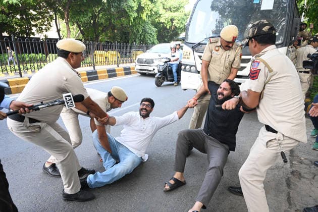 NEW DELHI, INDIA - JUNE 12: Security personnel dragged away Congress leaders and workers during a fierce protest at Nirvachan Sadan (Election Commission of India) against the rejection of Congress leader Meenakshi Natarajan s nomination for the Rajya Sabha election from Madhya Pradesh on June 12, 2026, in New Delhi, India.(Photo by Sonu Mehta Hindustan Times) Congress Workers Protest Outside Election Commission Against Disqualification Of Rajya Sabha Candidate Meenakshi Natarajan