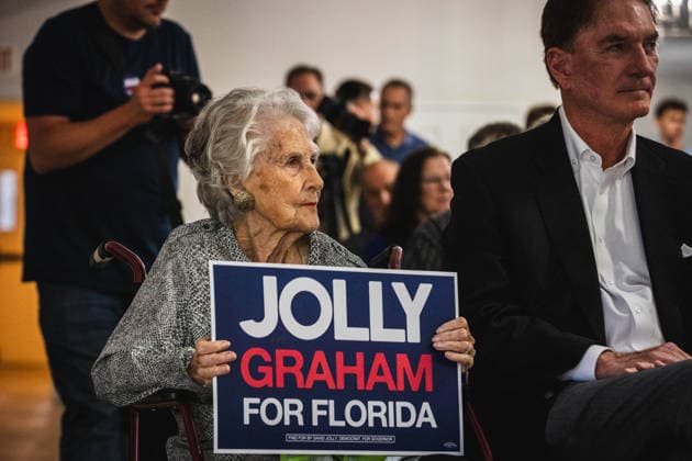 June 12, 2026, Tampa, Florida, USA: A woman holds a campaign sign as Democratic gubernatorial candidate DAVID JOLLY holds a campaign rally at The WomanÃ¢â‚¬â ¢s Club in South Tampa while introducing Rep. GWEN GRAHAM as his running mate for Lieutenant Governor. Tampa USA - ZUMAd256 20260612_znp_d256_037 Copyright: xDavexDeckerx