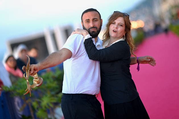 40th Cabourg Film Festival Day 3 FC Oussama Kheddam and Agnes Jaoui pose with his award on the red carpet during Day Three of the 40th Cabourg Film Festival on June 12, 2026 in Cabourg, France.. Photo by Franck Castel ABACAPRESS.COM Cabourg  Copyright: xCastelxFranck ABACAx