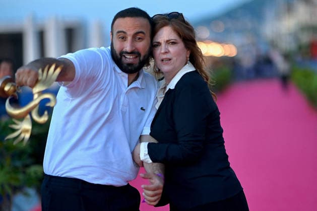40th Cabourg Film Festival Day 3 FC Oussama Kheddam and Agnes Jaoui pose with his award on the red carpet during Day Three of the 40th Cabourg Film Festival on June 12, 2026 in Cabourg, France.. Photo by Franck Castel ABACAPRESS.COM Cabourg  Copyright: xCastelxFranck ABACAx