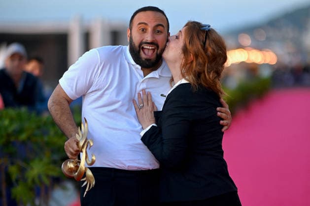 40th Cabourg Film Festival Day 3 FC Oussama Kheddam and Agnes Jaoui pose with his award on the red carpet during Day Three of the 40th Cabourg Film Festival on June 12, 2026 in Cabourg, France.. Photo by Franck Castel ABACAPRESS.COM Cabourg  Copyright: xCastelxFranck ABACAx