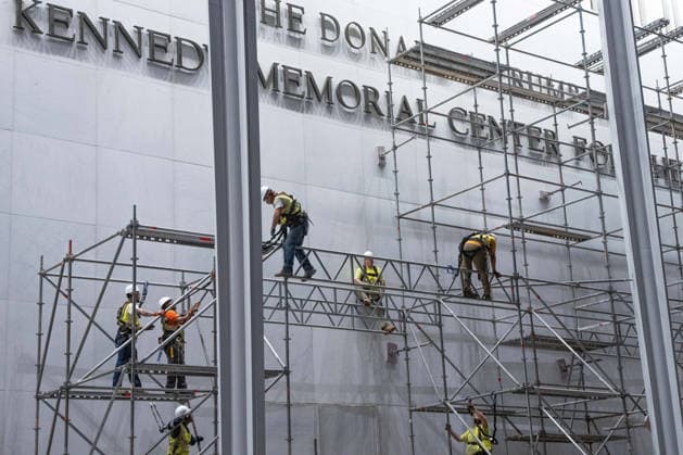 Construction workers build a scaffolding near the sign for the Donald J. Trump and The John F. Kennedy Memorial Center for the Performing Arts in Washington, DC on Friday, June 12, 2026. The Kennedy Center board voted to seek an emergency appeal to block a court order requiring the removal of President Trump s name from the Kennedy Center, but a judge denied their request.  WAP20260612009a AARONxSCHWARTZ
