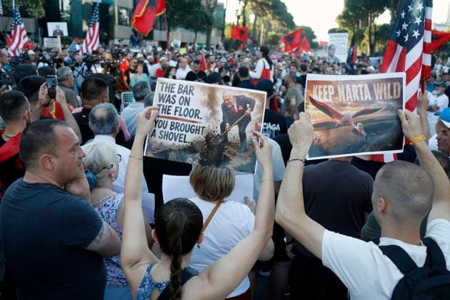 Protest against the construction of a luxury resort in Tirana, Albania. Protesters hold signs and Albanian national flags as they take part in a demonstration in front of the prime minister s office in Tirana on June 12, 2026, opposing the construction of a luxury resort in a protected natural area near the city of Vlore. Several thousand citizens demonstrated in Tirana for the 13th consecutive night to demand transparency on a luxury tourism complex project in the protected area of Narta Lagoon in the city of Vlore linked to US President Donald Trump s son-in-law Jared Kushner and his wife, Ivanka Trump. The project was planned for two areas along the Adriatic coast, the protected delta area of Vjosa-Narta and the nearby uninhabited island Copyright: xLightxStudioxAgencyx xMaltonxDibrax