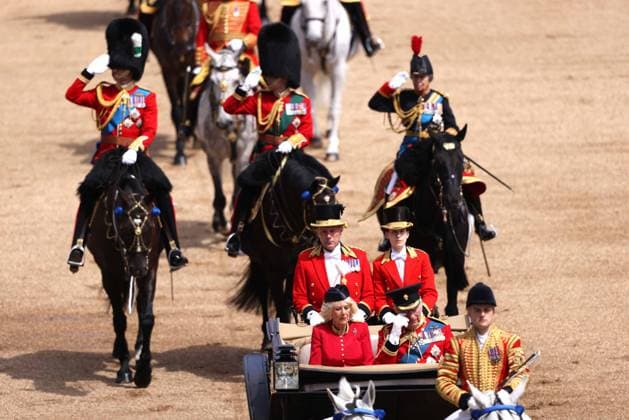 King Charles III, wipes his eyes, beside Queen Camilla, The King™s Birthday Parade, Trooping The Colour, takes places on Horse Guard™s Parade as The King™s Company, 1st Battalion Grenadier Guards, troop their colour in front of King Charles III. 1,350 soldiers, The Household Division and the King s Troop Royal Horse Artillery were in attendance, A flypast took place along The Mall and over Buckingham Palace, and included aircraft old and new, and was completed by the famous Red Arrows. Trooping The Colour, London, 13th June, 2026.  .