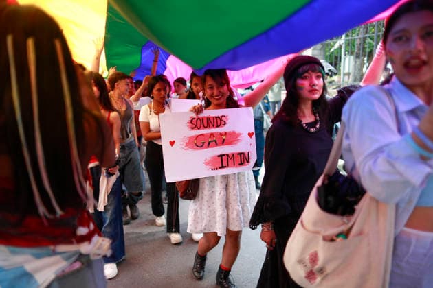 June 13, 2026, Kathmandu, Nepal: Participants hold the rainbow flag while taking part in a Pride Parade celebrating the LGBTIQA+ community. Kathmandu Nepal  - ZUMAs197 20260613_aaa_s197_042 Copyright: xSkandaxGautamx