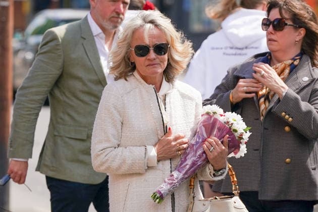 June 13, 2026, Nottingham, East Midlands, UK: Nottingham, UK. Dr Sinead O Malley, The mother of Grace O Malley Kumar holding flowers on Ilkeston Road in Nottingham. Today marks the third anniversary after Valdo Calocane murdered Barnaby Webber, Grace OÃ¢â‚¬â ¢Malley-Kumar and Ian Coates in Nottingham on 13 June 2026. Nottingham UK  - ZUMAl94_ 20260613_zaf_l94_080 Copyright: xIoannisxAlexopoulosx