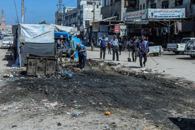 Teams affiliated with UNRWA carry out cleaning operations in Khan Yunis KHAN YUNIS, GAZA, PALESTINE - JUNE 13: Teams from the United Nations Relief and Works Agency for Palestine Refugees in the Near East (UNRWA) use heavy machinery to remove garbage piled up on the streets of Khan Yunis, Gaza, Palestine, on June 13, 2026. Waste has been accumulating on streets and near residential areas due to severe damage to infrastructure caused by attacks, insufficient municipal vehicles. Abed Rahim Khatib Anadolu Khan Yunis Gaza. Editorial use only. Please get in touch for any other usage.  Copyright: x2026xAnadoluxAbedxRahimxKhatibx