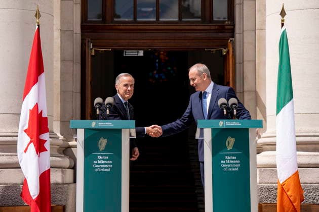 June 13, 2026, Dublin, Ireland: Prime Minister Mark Carney, left, shakes hands with Micheal Martin, Ireland s head of government, after giving remarks at the Government Buildings in Dublin, Ireland, on Saturday, June 13, 2026. Dublin Ireland  - ZUMAc35_ 20260613_zaf_c35_026 Copyright: xChristopherxKatsarovx