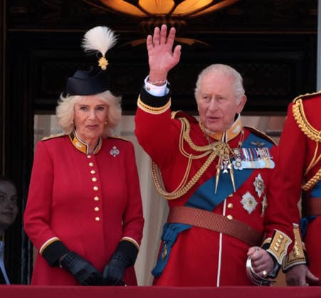 King Charles III waves to the public on the balcony of Buckingham Palace after the annual Trooping the Colour in recognition of the King s birthday at Horseguards Parade on Saturday June 13, 2026.  LON2026061340 HUGOxPHILPOTT