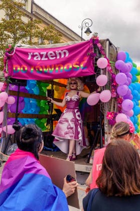The 25th Pride Warsaw. On the party Razem platform, a drag queen in a dress made from banners of a lider Adrian Zandberg. Warsaw Poland Copyright: xMikolajxJaneczekx