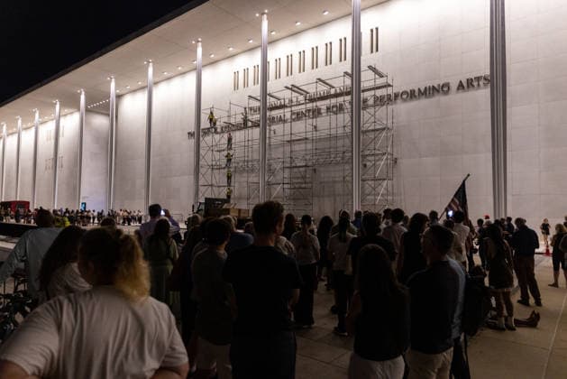 Removal of US President Trump’s name from the Kennedy Center WASHINGTON, DC, UNITED STATES - JUNE 13: People watch as workers set up scaffolding on the facade of the Kennedy Center, ahead of the removal of US President Trump’s name from the building, in Washington, DC, United States, on June 13, 2026. Nathan Posner Anadolu Washington, DC United States. Editorial use only. Please get in touch for any other usage.  Copyright: x2026xAnadoluxNathanxPosnerx
