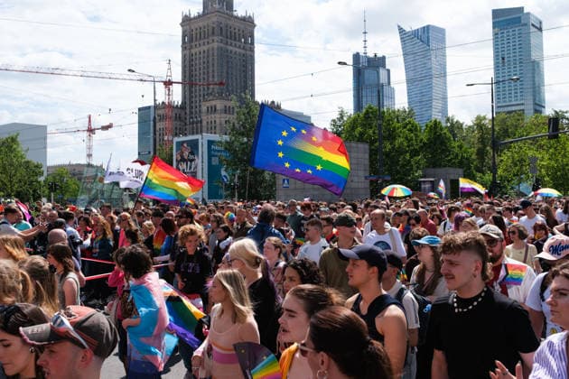 June 13, 2026, Warsaw, Masovian Voivodeship, Poland: A rainbow European Union flag waves in the air among a large crowd of people during the 25th annual Warsaw LGBTQ+ Pride Parade, known in Polish as the Equality Parade. LGBTQ+ people in Poland do not have the right to same-sex civil partnerships, marriage, and child adoption, while also facing homophobia and queerphobia from a largely conservative society. Therefore, the parade is organized primarily as a march for equal rights. Warsaw Poland  - ZUMAk204 20260613_zip_k204_003 Copyright: xRomanxKozielx