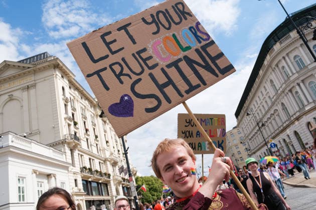 June 13, 2026, Warsaw, Masovian Voivodeship, Poland: A person holds a sign that reads let your true colors shine during the 25th annual Warsaw LGBTQ+ Pride Parade, known in Polish as the Equality Parade. LGBTQ+ people in Poland do not have the right to same-sex civil partnerships, marriage, and child adoption, while also facing homophobia and queerphobia from a largely conservative society. Therefore, the parade is organized primarily as a march for equal rights. Warsaw Poland - ZUMAk204 20260613_zip_k204_019 Copyright: xRomanxKozielx