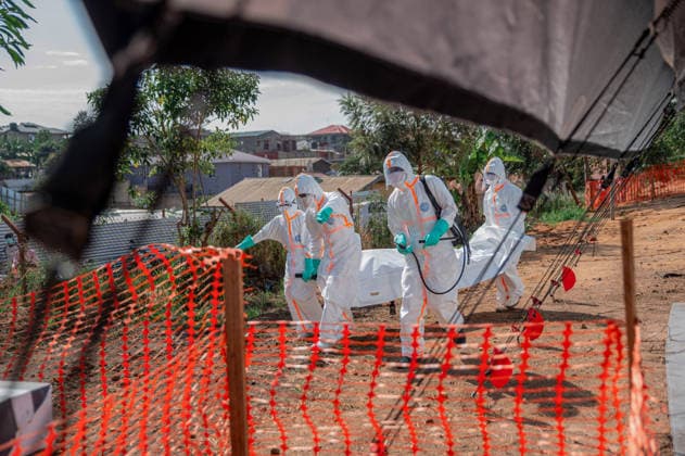 Ebola outbreak in Democratic Republic of Congo BUNIA, DEMOCRATIC REPUBLIC OF THE CONGO - JUNE 13: A body is taken to the morgue of Nyankunde Medical Center for burial procedures by health teams wearing protective suits as part of epidemic control measures, as an infected citizen who has the Ebola virus has died in Bunia, Democratic Republic of the Congo (DRC), on June 13, 2026. Stringer Anadolu Bunia Democratic Republic of the Congo. Editorial use only. Please get in touch for any other usage.  Copyright: x2026xAnadoluxStringerx