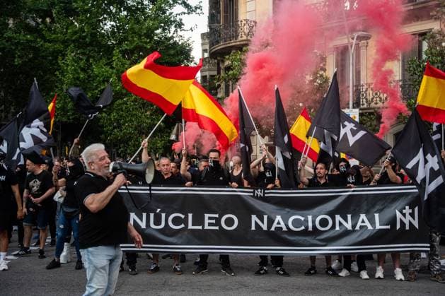 Rally of the ultranationalist group Nucleo Nacional in Barcelona BARCELONA, SPAIN - JUNE 13. Around 50 ultranationalists from Nucleo Nacional group gathered in front of the Spanish government delegation in Barcelona to protest the city s insecurity, which they attribute to immigration. During their speeches, they championed the Aryan race, stating they would fight even if it meant shedding blood, and the Nazi salute was seen. Barcelona Spain Copyright: x xMarcxAsensioxClupÃ sx xJNAxPressx