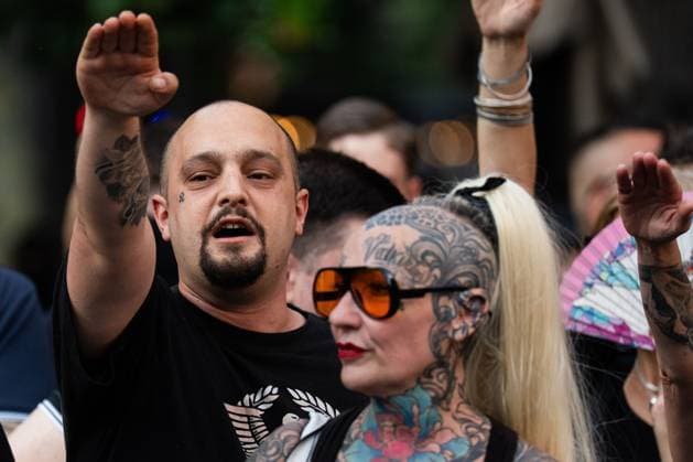 Rally of the ultranationalist group Nucleo Nacional in Barcelona BARCELONA, SPAIN - JUNE 13. Around 50 ultranationalists from Nucleo Nacional group gathered in front of the Spanish government delegation in Barcelona to protest the city s insecurity, which they attribute to immigration. During their speeches, they championed the Aryan race, stating they would fight even if it meant shedding blood, and the Nazi salute was seen. Barcelona Spain Copyright: x xMarcxAsensioxClupÃ sx xJNAxPressx