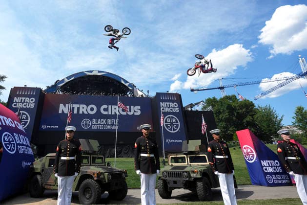 Motorsports athletes and stunt performers do a motorcycle jump ahead of the UFC Freedom 250 fights on the South Lawn of the White House in Washington, DC on Saturday, June 13, 2026.  WASP20260613110 AlexxBrandon