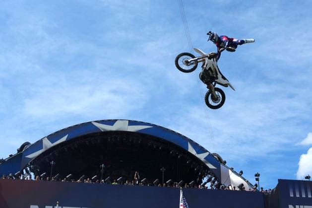 Motorsports athletes and stunt performers do a motorcycle jump ahead of the UFC Freedom 250 fights on the South Lawn of the White House in Washington, DC on Saturday, June 13, 2026.  WASP20260613111 AlexxBrandon