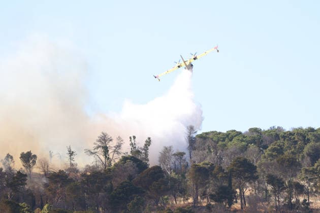 Firefighters response to wildfires in two regions in southern Italy SICILY, ITALY - JUNE 13: Two Canadair aircraft and three helicopters take part in an extinguishing work after a large fire has broken out in Montagna Grande, a town in Salemi, near Trapani in Sicily, Italy on June 13, 2026. Alberto Lo Bianco Anadolu Sicily Italy. Editorial use only. Please get in touch for any other usage.  Copyright: x2026xAnadoluxAlbertoxLoxBiancox