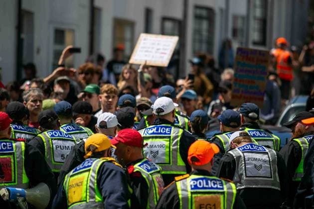 June 13, 2026, Brighton, UK: Brighton, UK. 13 June 2026. Police officers during an anti-immigration protest in the city centre of Brighton. The South East Patriots group hold a march through the centre of Brighton, with about twenty groups under the banner the Carnival Against Fascism organising a counter protest. Police officers kept the two groups apart as tensions were running high. South East Patriots claimed the protest was to demand stronger border control, enforcement of immigration laws, and the deportation of illegal immigrants, with the counter protest groups expressing their resistance against the far right as well as to any form of fascism and racism Brighton UK - ZUMAd99_ 20260613_zap_d99_106 Copyright: xMattxDuckettx