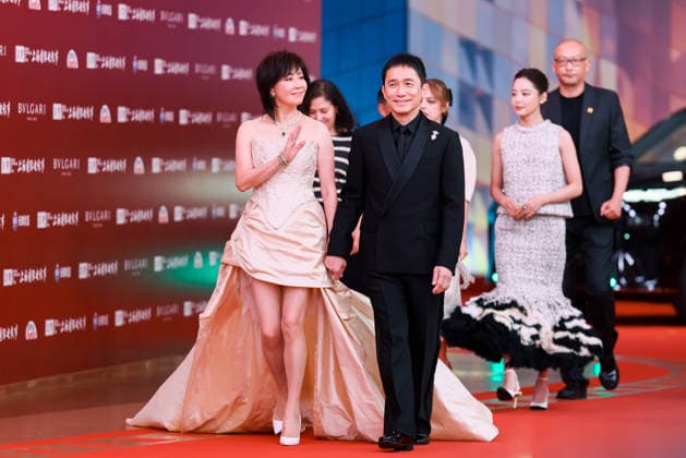 SHANGHAI, CHINA - JUNE 13: Actor Tony Leung Chiu-wai and his wife actress Carina Lau Kar-ling arrive at the red carpet of the 28th Shanghai International Film Festival Gala Night on June 13, 2026 in Shanghai, China.  Copyright: xVCGx 111648017300