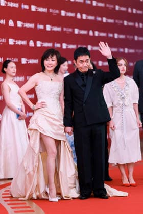 SHANGHAI, CHINA - JUNE 13: Actor Tony Leung Chiu-wai and his wife actress Carina Lau Kar-ling arrive at the red carpet of the 28th Shanghai International Film Festival Gala Night on June 13, 2026 in Shanghai, China.  Copyright: xVCGx 111648017311