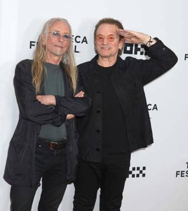 June 13, 2026, New York, New York, USA: Artist GUGGI and rock star BONO seen during the red carpet arrivals at the Spotlight Documentary Screening of Guggi held at the SVA Theater during the Tribeca Film Festival. New York USA  - ZUMAk03_ 20260613_zaf_k03_128 Copyright: xNancyxKaszermanx