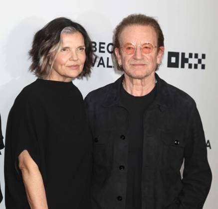 June 13, 2026, New York, New York, USA: Rock star BONO and his wife ALI HEWSON seen during the red carpet arrivals at the Spotlight Documentary Screening of Guggi held at the SVA Theater during the Tribeca Film Festival. New York USA  - ZUMAk03_ 20260613_zaf_k03_119 Copyright: xNancyxKaszermanx