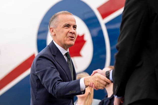 June 14, 2026, Dublin, Ireland: Prime Minister Mark Carney meets with embassy staff before boarding a government plane in Dublin, on Sunday, June 14, 2026. Dublin Ireland  - ZUMAc35_ 20260614_zaf_c35_006 Copyright: xChristopherxKatsarovx