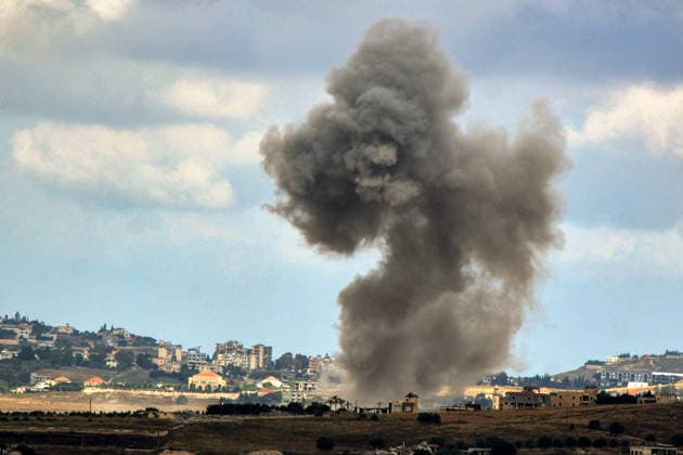June 14, 2026, Kfar Tebniet, Kfar Tebniet, Lebanon: Smoke billows from Israeli air strikes from the southern Lebanese village of Kfar Tebniet on the outskirts of the major city of Nabatieh. The Israeli army issued warning to evacuate 29 villages and towns in southern Lebanon as it continued its ground advance making the deepest incursion into Lebanese territory in over a quarter of a century. Troops have established a presence on the suburbs of Nabatieh after seizing several strategic points. Kfar Tebniet Lebanon  - ZUMAn313 20260614_zip_n313_004 Copyright: xMarwanxNaamanix