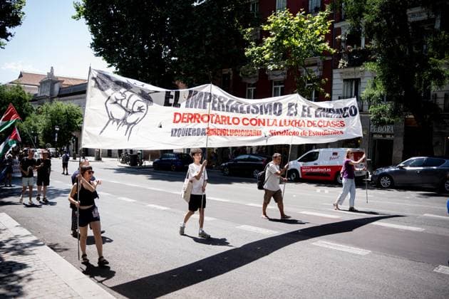 Demonstration in Madrid against rearmament and imperialist war Several people carry a banner with the slogan Imperialism is the enemy during a demonstration to protest against rearmament and imperialist war, on June 14, 2026, in Madrid Spain The call is part of the international context of escalating war, In the Spanish state, military spending has increased by 50 percent -the second largest increase in the EU-, while the government keeps the Rota and Morón bases active, continues to buy arms from Israel and reinforces its commitment to NATO 14 JUNE 2026 PACIFISM DEMONSTRATION Madrid Madrid Spain  Copyright: xGabrielxLuengasx 7596034