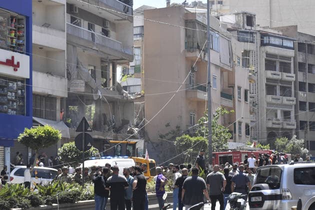 Israeli airstrike hits Beirut despite ceasefire: 3 killed BEIRUT, LEBANON - JUNE 14: A view of damage as security forces and emergency responders inspect the site after an Israeli airstrike hit Beirut s southern suburb of Dahiye despite an existing ceasefire, in Beirut, Lebanon, on June 14, 2026. At least three people were killed and 15 others injured in the Israeli strike. Houssam Shbaro Anadolu Beirut Lebanon. Editorial use only. Please get in touch for any other usage.  Copyright: x2026xAnadoluxHoussamxShbarox