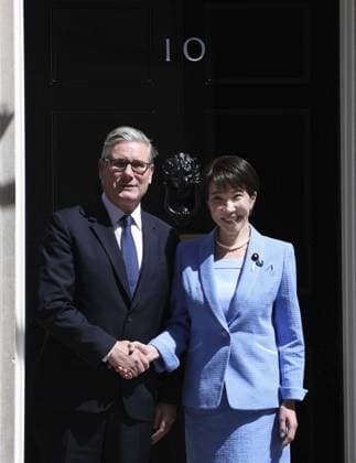 Japan-Britain summit Japanese Prime Minister Sanae Takaichi (R) is greeted by her British counterpart Keir Starmer ahead of their talks in London on June 14, 2026. (Pool photo)  A14AA0005618732P