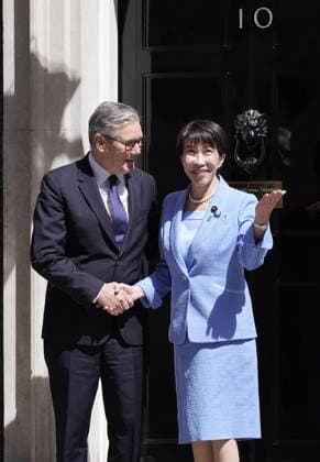 Japan-Britain summit Japanese Prime Minister Sanae Takaichi (R) is greeted by her British counterpart Keir Starmer ahead of their talks in London on June 14, 2026. (Pool photo)  A14AA0005618734P