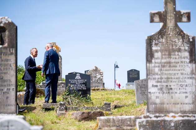 June 14, 2026, Aghagower, County Mayo, Ireland: Prime Minister Mark Carney walks in the St Patrick Church cemetary with Harry Hughes, in Aghagower, County Mayo, Ireland, on Sunday, June 14, 2026. Aghagower, County Mayo Ireland  - ZUMAc35_ 20260614_zaf_c35_033 Copyright: xChristopherxKatsarovx