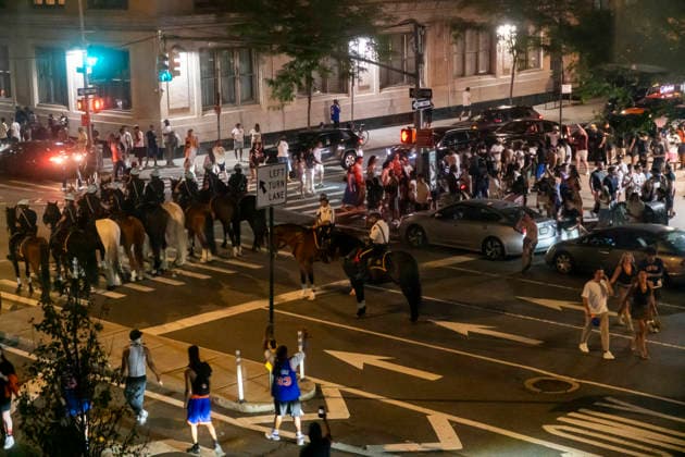 NY Knicks win NBA finals NYPD officers, including the Strategic Response Group and mounted officers, perform crowd control on Ninth Avenue in Chelsea in New York on Saturday, June 13, 2026 after crowds of NY Knicks fans flood the streets celebrating the teams winning the NBA Finals against the San Antonio Spurs. (  RichardxB.xLevine