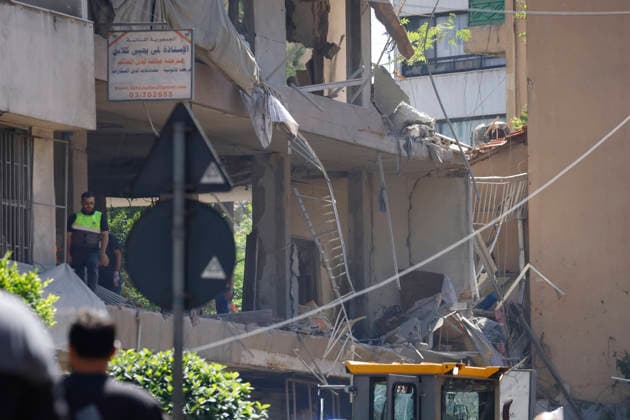 June 14, 2026, Souhen Suberbs Of Beirut, Beirut, lebanon: Emergency teams continued search and rescue operations following an Israeli airstrike on the Ghobeiry area in BeirutÃ¢â‚¬â ¢s southern suburbs. According to updated preliminary figures, the strike killed three people and injured fifteen others. Civil Defense and ambulance crews worked through the rubble of damaged buildings searching for possible missing victims, while authorities assessed extensive destruction to nearby residential buildings and commercial shops. Souhen Suberbs Of Beirut lebanon  - ZUMAb339 20260614_znp_b339_001 Copyright: xAbdulxKaderxAlxBayx