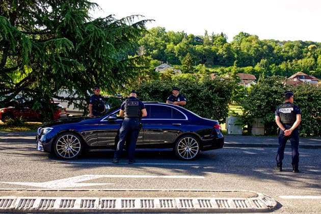 June 14, 2026, Publier, Haute-Savoie, France: PUBLIER, FRANCE - JUNE 14, 2026: French National Police officers conduct vehicle inspections and security checks in Publier, France, near the official media center for the Evian G7 summit. French authorities have reinforced patrolling and security measures across the region to ensure the safety of international delegations, summit personnel, and accredited journalists. Publier France - ZUMAc267 20260614_zip_c267_002 Copyright: xMarcoxCordonex