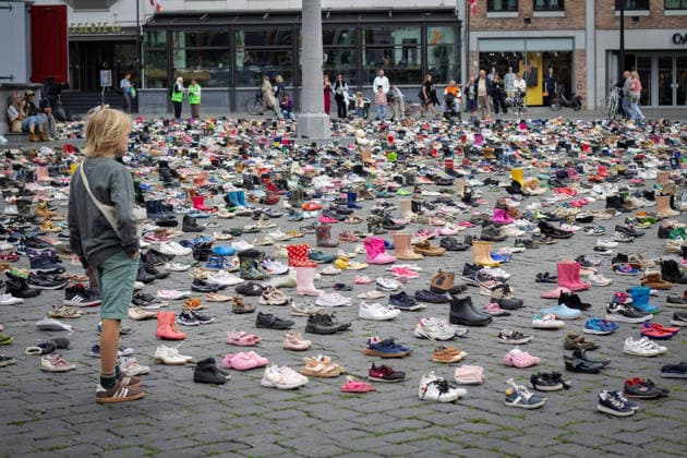 Commemoration in Bosch for Palestinian children and journalists killed by Israel BOSCH, NETHERLANDS - JUNE 14: Photographs and names of journalists killed in the Israeli attacks on Gaza, and thousands of children’s shoes are displayed during a commemoration event held for Palestinian children and journalists killed in Israel’s attacks on Gaza in Bosch, Netherlands on June 14, 2026. Organized by the Plant an Olive Tree Foundation in Markt Square in the city center of Den Bosch, the event honored Palestinian children and journalists who lost their lives in Israeli attacks in Gaza. Abdullah Asiran Anadolu Bosch Netherlands. Editorial use only. Please get in touch for any other usage.  Copyright: x2026xAnadoluxAbdullahxAsiranx