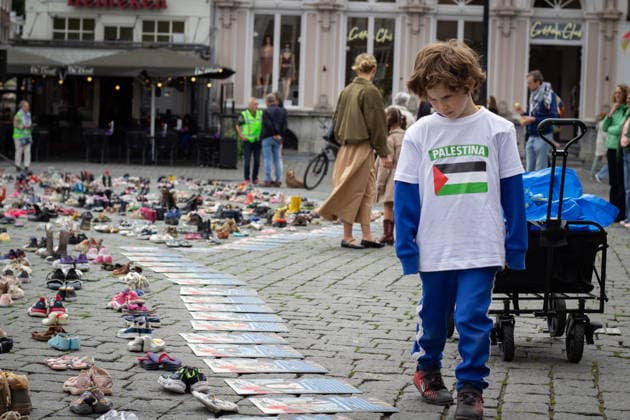 Commemoration in Bosch for Palestinian children and journalists killed by Israel BOSCH, NETHERLANDS - JUNE 14: Photographs and names of journalists killed in the Israeli attacks on Gaza, and thousands of children’s shoes are displayed during a commemoration event held for Palestinian children and journalists killed in Israel’s attacks on Gaza in Bosch, Netherlands on June 14, 2026. Organized by the Plant an Olive Tree Foundation in Markt Square in the city center of Den Bosch, the event honored Palestinian children and journalists who lost their lives in Israeli attacks in Gaza. Abdullah Asiran Anadolu Bosch Netherlands. Editorial use only. Please get in touch for any other usage.  Copyright: x2026xAnadoluxAbdullahxAsiranx