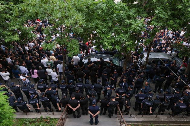 ARMENIA, YEREVAN - JUNE 14, 2026: Police officers stand guard outside the offices of the Central Electoral Commission of Armenia during the announcement of the results of the 2026 Armenian parliamentary election. Alexander Patrin TASS  93808247