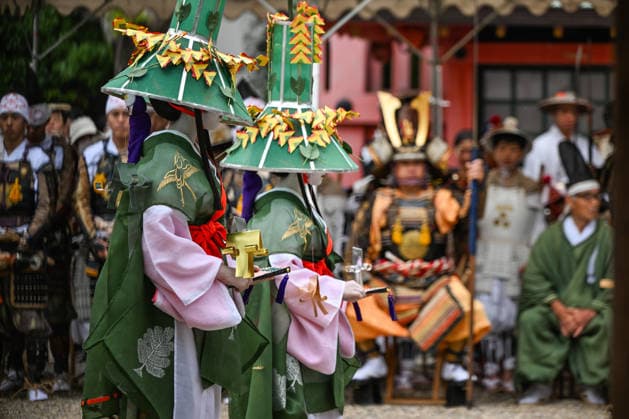 Osaka Keeps Centuries Old Otaue Rice Festival alive OSAKA, JAPAN - JUNE 14: Ueme rice-planting maidens stand in formation before seated Furyu-musha samurai warriors and shrine elders during the historic Otaue Rice Planting Festival (Otaue Shinji) at Sumiyoshi Taisha Shrine in southern Osaka, Japan, on June 14, 2026. The ancient agricultural ritual, officially designated as an Important Intangible Folk Cultural Property of Japan, brings together various ceremonial groups—including the seedling-carrying maidens and armored warriors—on the shrine grounds before proceeding to the sacred paddy field to pray for a bountiful harvest. Artur Widak Anadolu Agency Anadolu Osaka Japan. Editorial use only. Please get in touch for any other usage.  Copyright: x2026xAnadoluxArturxWidak AnadoluxAgencyx