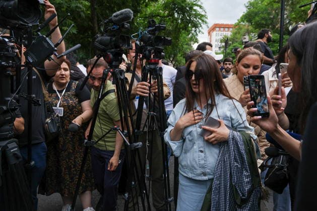 ARMENIA, YEREVAN - JUNE 14, 2026: People are seen outside the offices of the Central Electoral Commission of Armenia during the announcement of the results of the 2026 Armenian parliamentary election. Alexander Patrin TASS  93809105