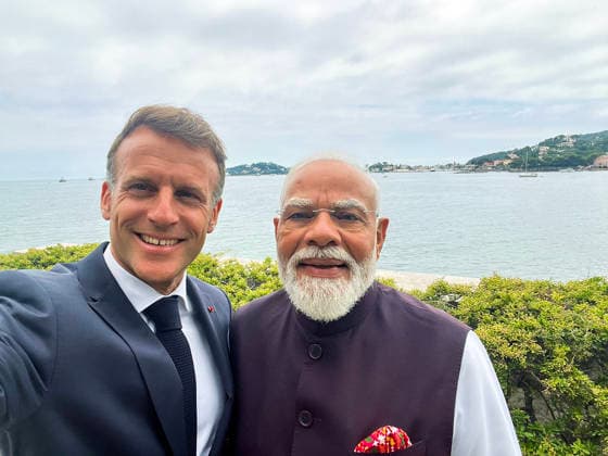 RECORD DATE NOT STATED French President Emmanuel Macron clicks a selfie with PM Modi Nice France , Jun 14 (ANI): French President Emmanuel Macron clicks a selfie with Prime Minister Narendra Modi at Villa Kerlyos, in Nice on Sunday. (@Elysee X ANI Photo) Nice France Copyright: xANIx ANI_20260614372