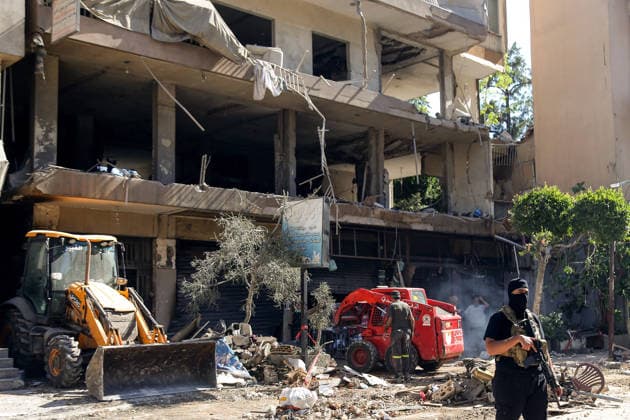 June 14, 2026, Beirut, Beirut, Lebanon: A member of Lebanese army intelligence secures that site where a building was targeted by Israeli strike in Beirut southern suburb, a bastion of pro-Iranian Hezbollah. Three people were killed in the attack, according to Lebanon s state media. The Israel Defense Forces (IDF) said it targeted a command center used by Hezbollah after the Iran-backed armed group launched aerial targets toward Israel Beirut Lebanon  - ZUMAn313 20260614_zip_n313_016 Copyright: xMarwanxNaamanix