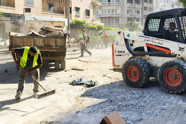 LEBANON, BEIRUT - JUNE 14, 2026: Clearing rubble outside an apartment building south of Beirut after an airstrike. Ankhar Kochneva TASS  93809760